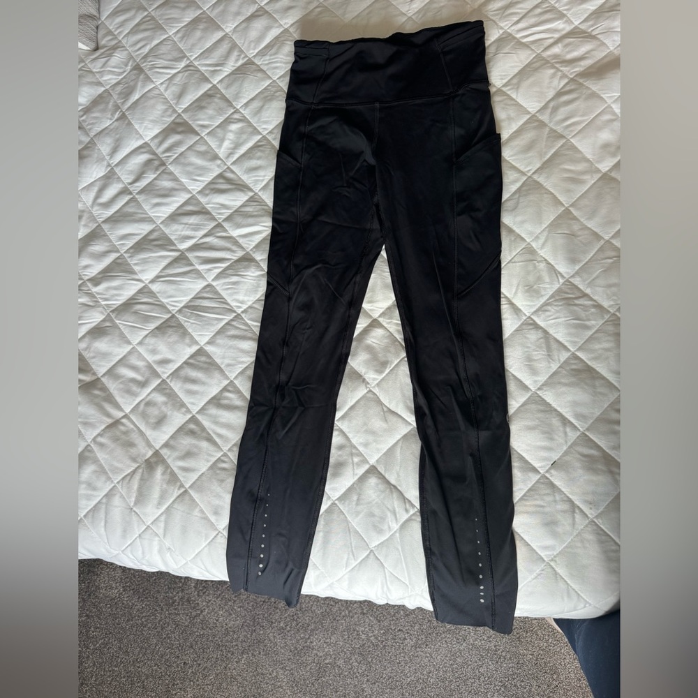 Lululemon fast and free right. Size 4 black